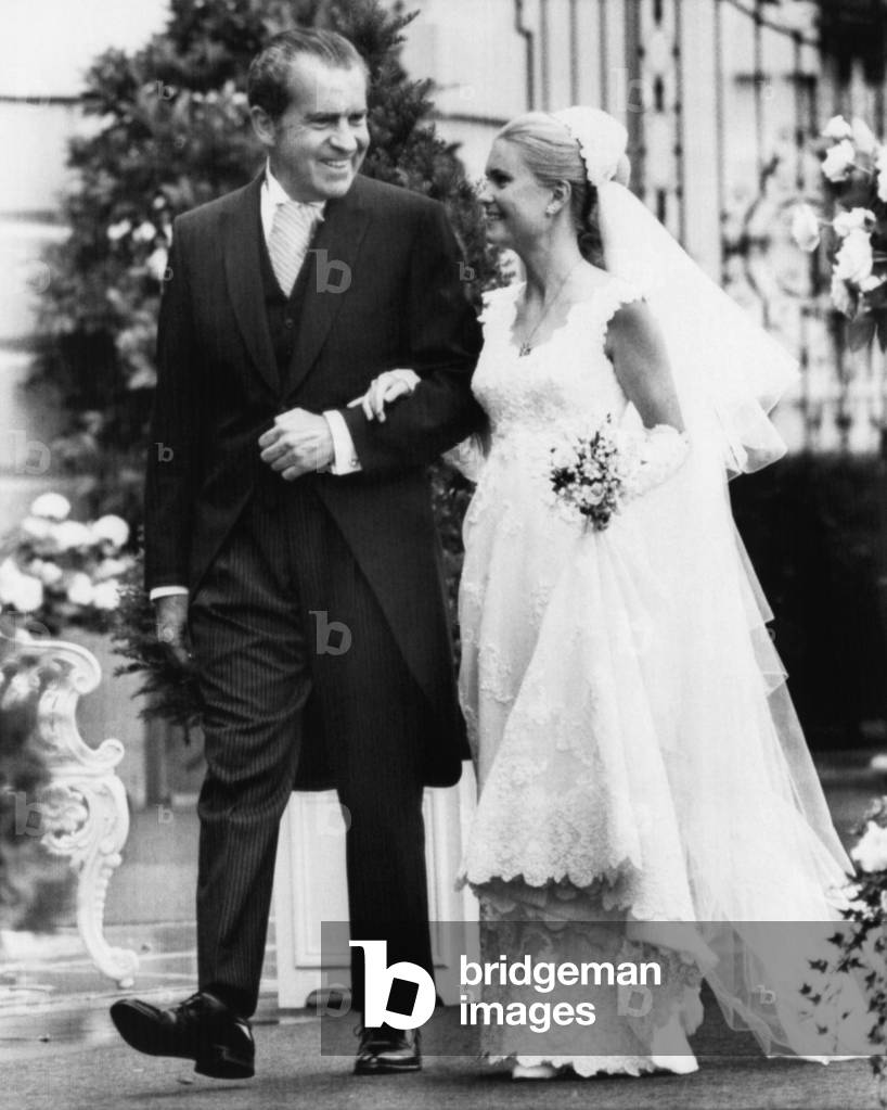 1971 US Presidency, Nixon Family. US President Richard Nixon escorting daughter Tricia Nixon to the White House Rose Garden, shortly before her marriage to Edward Cox, Washington D.C., June 12, 1971