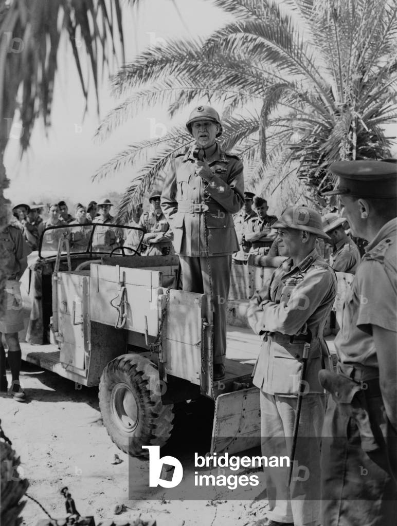Prime Minister Jan Christiaan Smuts, speaks to South African troops from the back of truck. c.1941-43 (b/w photo)