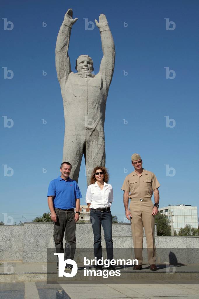 US Astronauts and Russian Cosmonauts pose in front of a monumental statue of Yuri Gagarin. The International Space Station Expedition 14 crew are in Baikonur, Kazakhstan to prepare from their Sept. 18, 2006 launch