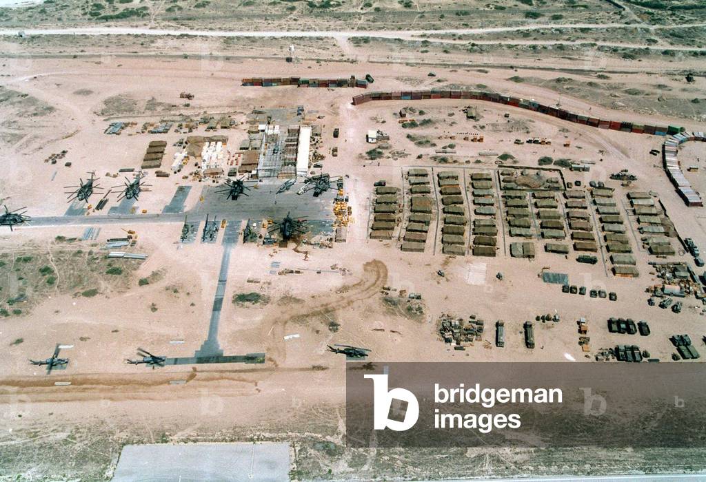 Base of the U.N. mostly U.S. Marine Forces in Somalia was built on an abandoned Soviet airfield in Mogadishu. It had a wall of shipping containers upper right to thwart random sniper fire. Feb. 25 1993