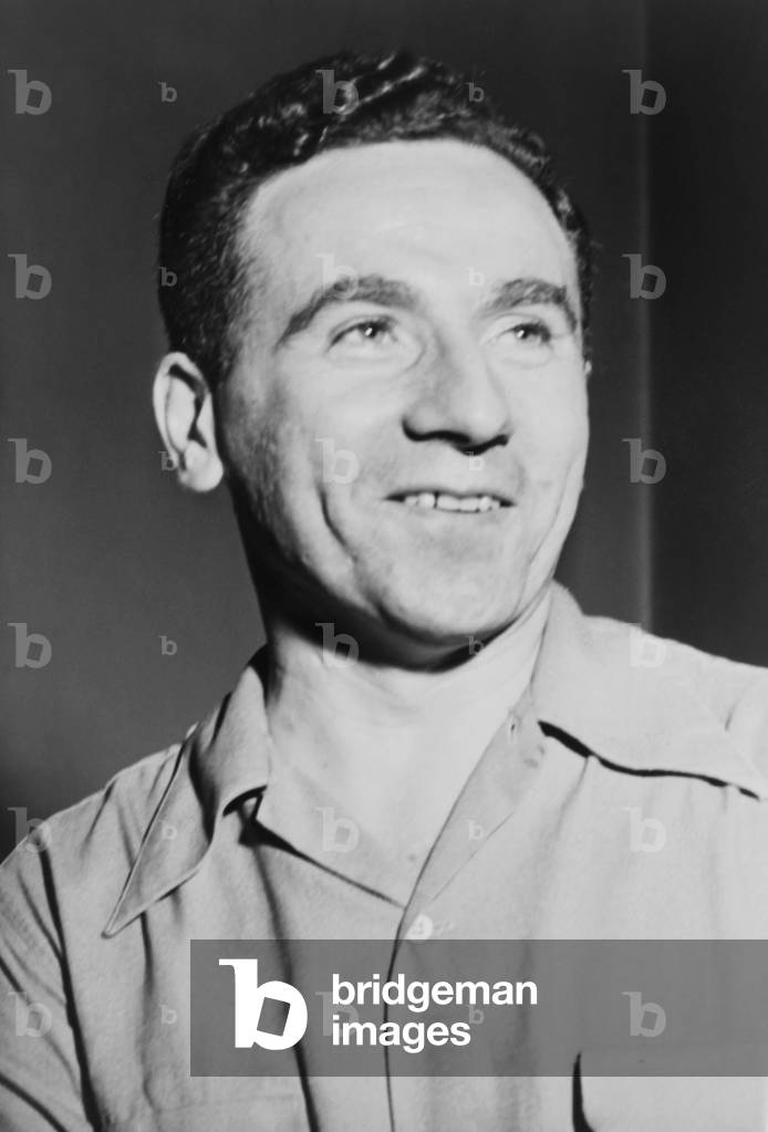 John Gates, American Communist Party member and leader in 1948. At this time he was indicted under the Smith Act for being 'dedicated to the Marxist-Leninist principles of the overthrow and destruction of the Government.' He was convicted, served five years in prison, after which he became editor of the Communist Party's newspaper, 'The Daily Worker'