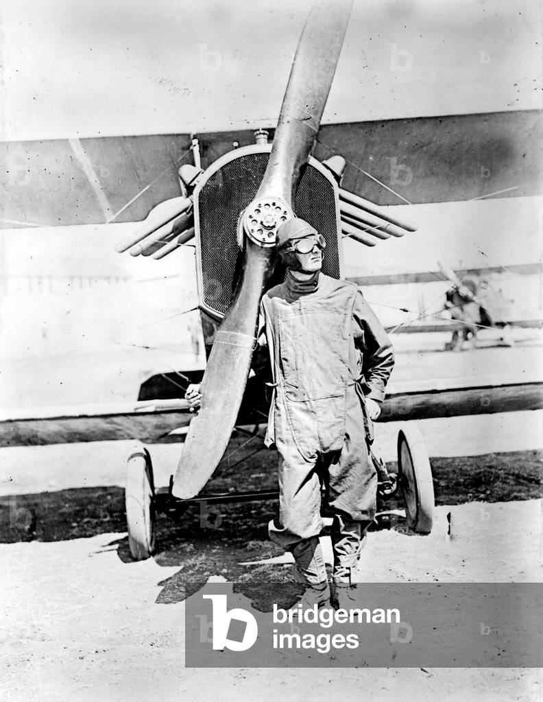 Pilot standing in front of U.S. Army airplane during World War I, c.1918