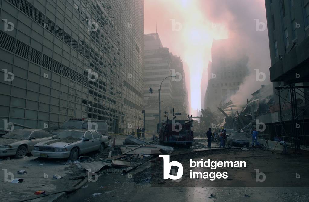 The wreckage of WTC 7, the newest building in the complex which collapsed at 5:20 PM on 9-11. Photo was taken on Barclay Street, looking east toward West Broadway. World Trade Center, New York City, after September 11, 2001 terrorist attacks