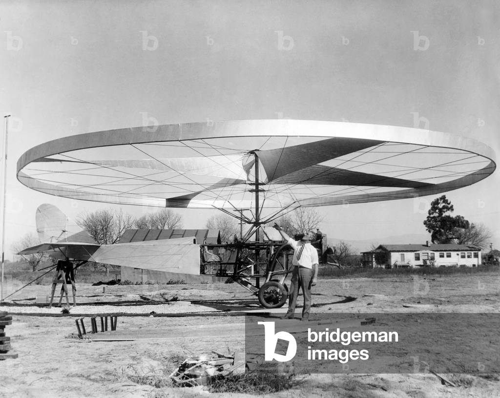 Helio-Gyro-Copter invented by Jesse D. Langdon. The propeller and its wide circular rim act both as a gyroscope and a rotor. It weighed 1659 pounds and had a 625-horsepower motor. Nov. 12, 1930
