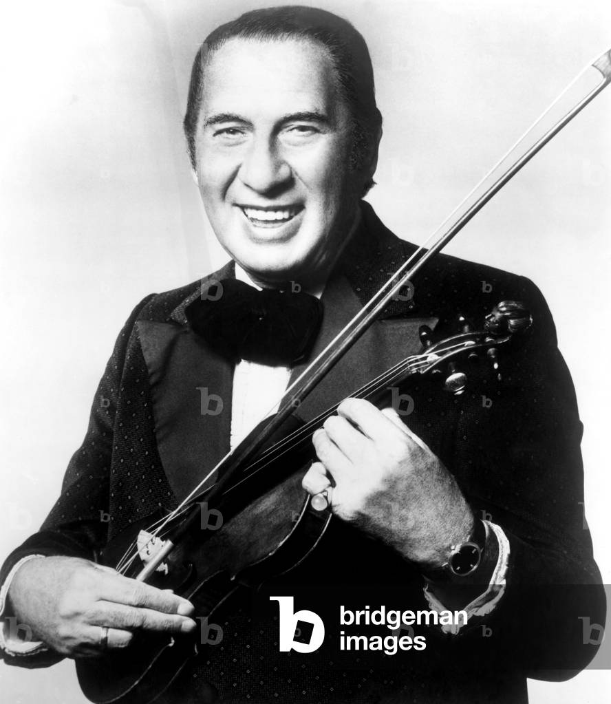 Henny Youngman, (1906-1998), violinist and comedian, 1973.