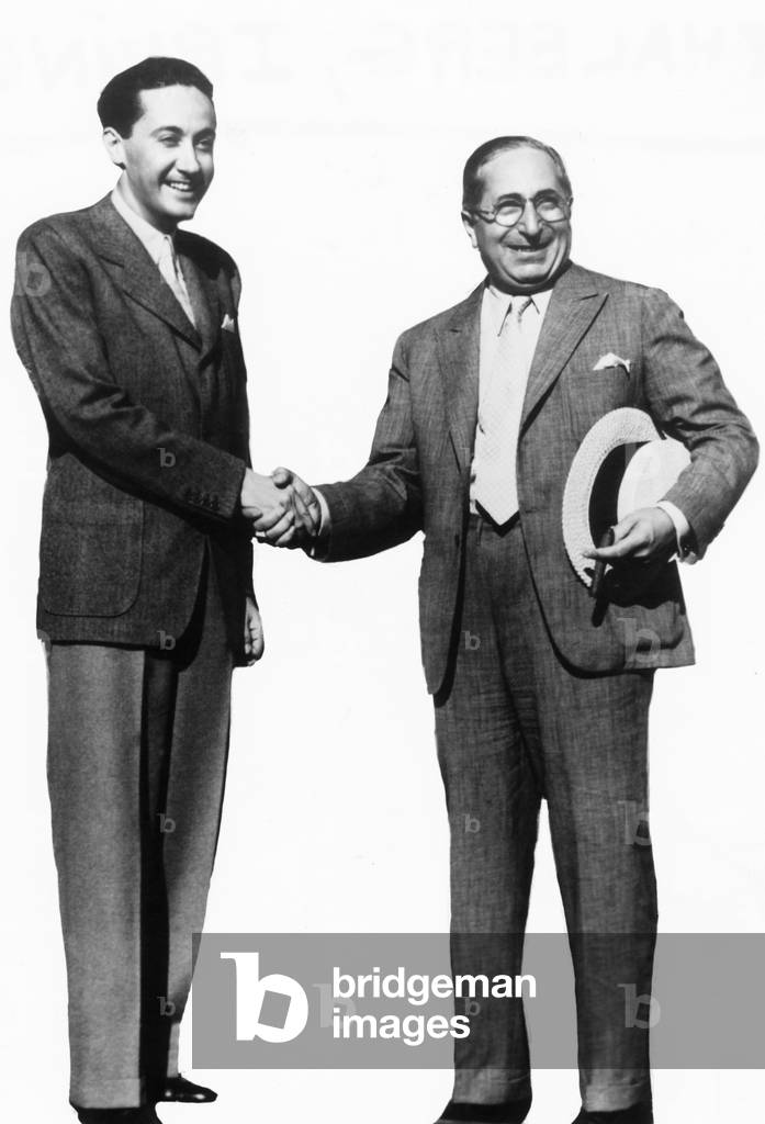 Louis B. Mayer (right) and Irving Thalberg, during Hollywood's 1920s and 1930s. Thalberg was called 'The Boy Wonder' for making very profitable films, including GRAND HOTEL, CHINA SEA, CAMILLE, MUTINY ON THE BOUNTY and THE GOOD EARTH. His career was cut short by his death from pneumonia in 1936.