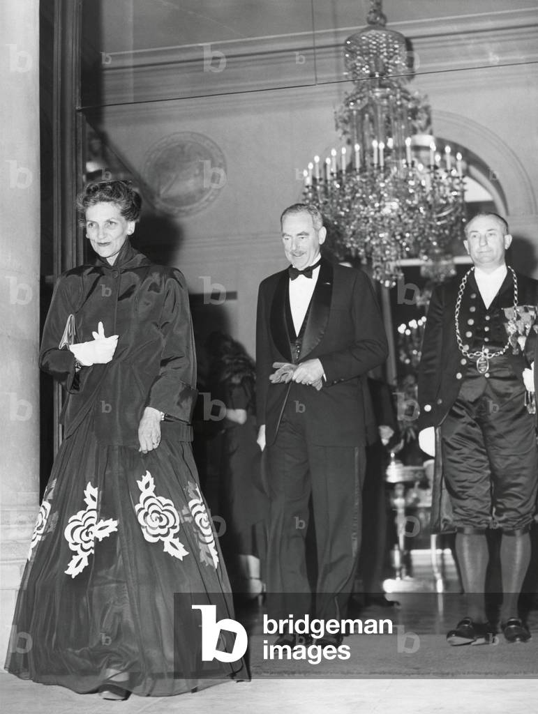 U.S. Sec. of State, Dean Acheson and his wife, Alice Stanley Acheson, leaving the Elysee Palace. Paris, June 29, 1949.