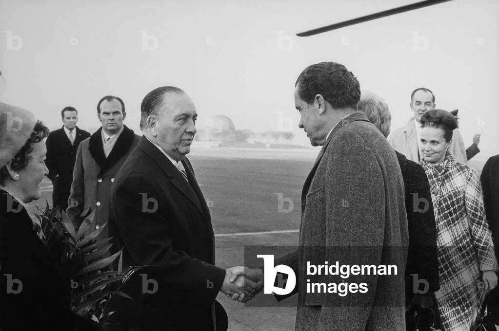 President Nixon shakes hands with Mayor Richard Daley on his arrival in Chicago Illinois. Daley a powerful Democratic Party boss found common cause with Nixon's centrist domestic policies. c. 1968-72