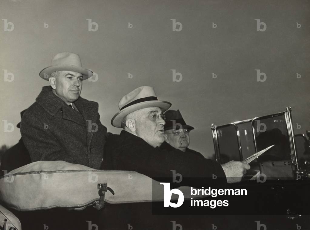 Pres. Franklin Roosevelt with Resettlement Administrator, Rex Tugwell. Feb. 1937. They are inspecting Greenbelt, Maryland, a model planned community for relocated urban and rural families