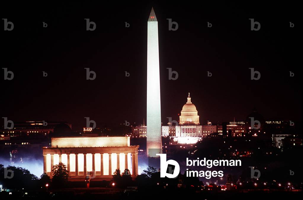 The Lincoln Memorial the Washington Monument and the US Capitol illuminated for the inaugural ceremonies of George H. W. Bush 41st president of the United States. Jan 18 1989