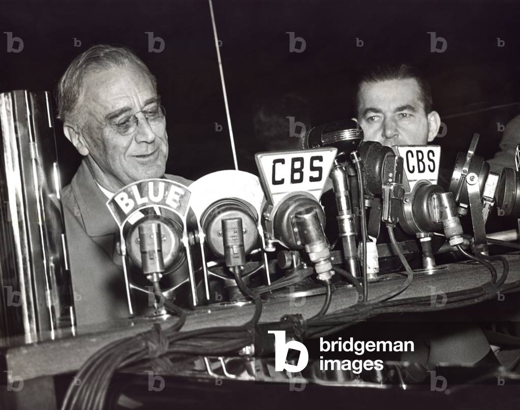 Franklin Roosevelt campaigns for a fourth term as President in Boston. Nov. 4, 1944. He delivers a speech at Fenway Park with Robert Hannagan, chairman of the Democratic National Committee, at right