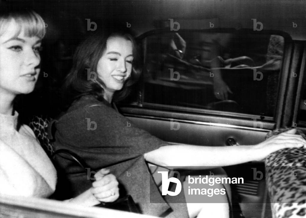 Mandy Rice Davies and Christine Keeler leaving Old Bailey after the first day of their trial in the Profumo scandal, July 22, 1963