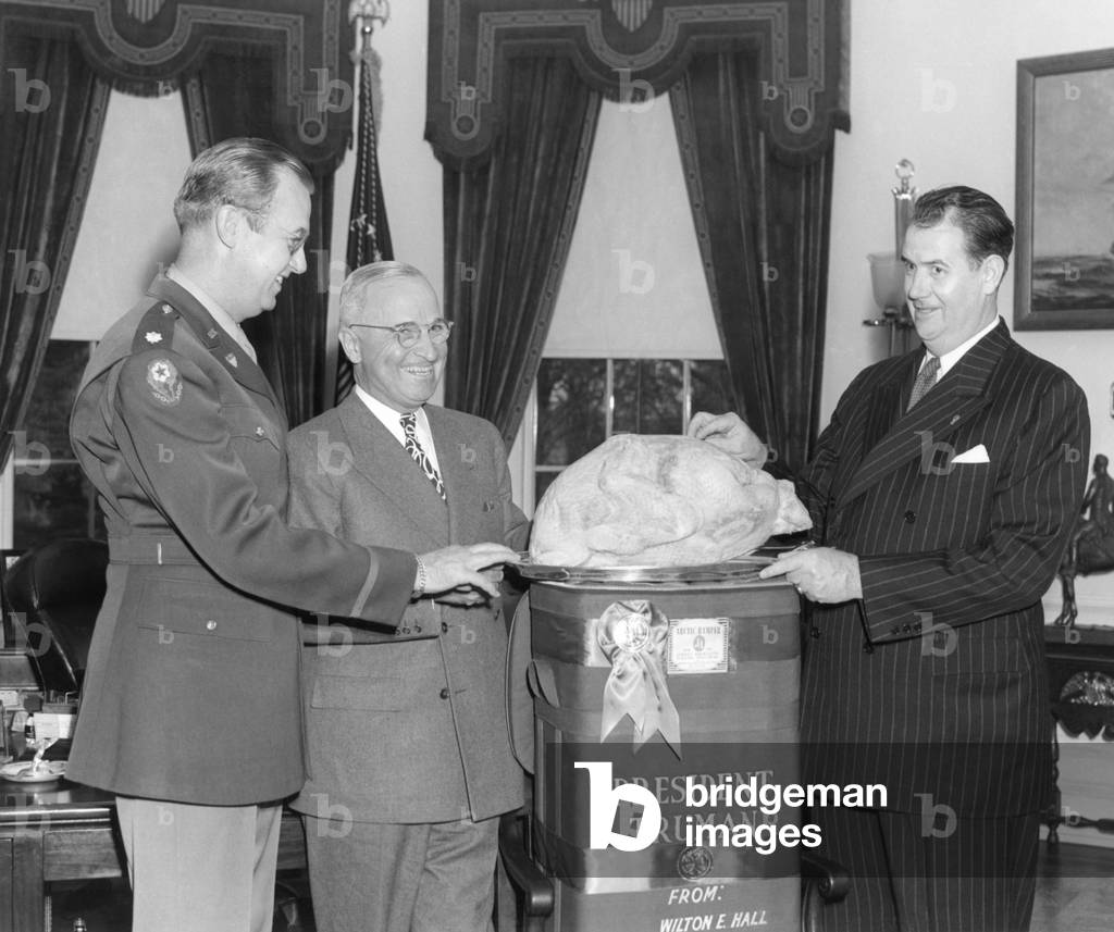 President Harry Truman accepts a turkey from Senator Olin Johnston of South Carolina, 1946