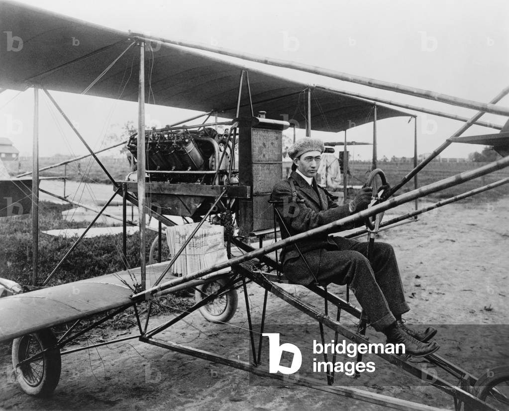 Glenn Martin (1886-1955), delivering newspapers in his airplane. He built his first airplane in 1909, and his first airplane factory in 1912 in Los Angeles, California. He successfully promoted his airplanes by stunt flying, and other attention getting gimmicks. c. 1911
