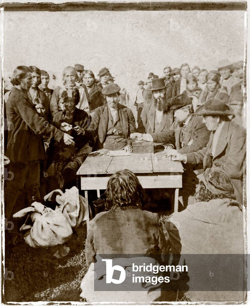 Cherokee Tribe. Possible scene of Federal payouts to Cherokee men. Stereocard, c. 1870