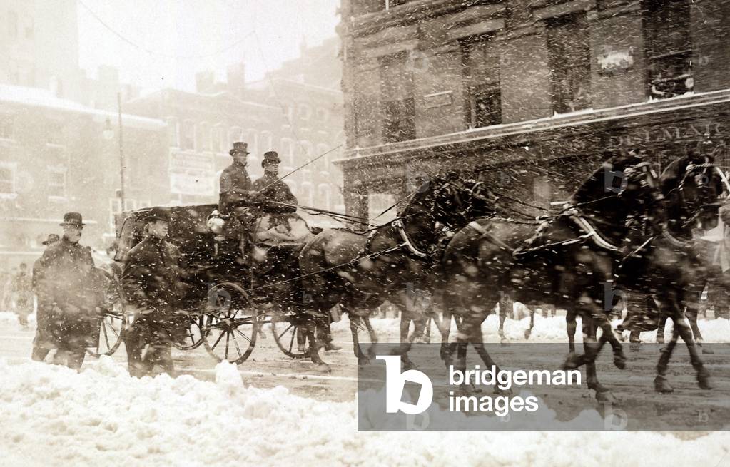 Horse drawn carriage carrying incoming President Taft, and Presiednt Theodore Roosevelt as they drive to the Capitol through the snow on March 4, 1909