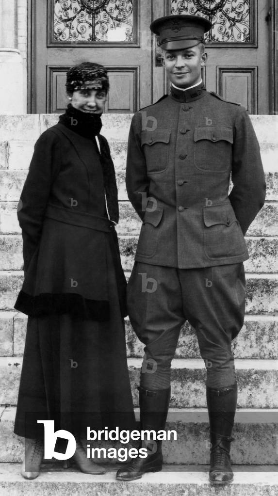 Mamie Eisenhower and Dwight Eisenhower. They are on the front steps of St. Louis Hall, St. Mary's University, San Antonio, Texas in 1916, the year of their marriage