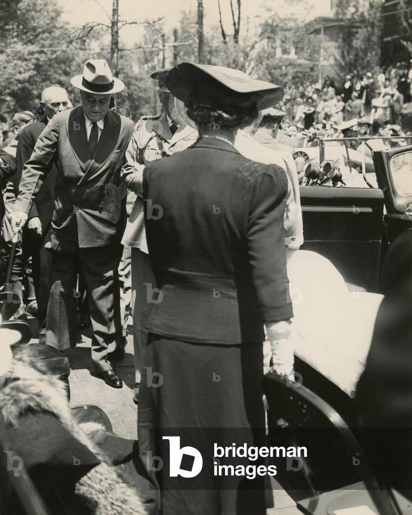 Franklin Roosevelt walks with assistance in Staunton, Virginia. May 4, 1941. FDR was at the dedication ceremony for the Home of Woodrow Wilson. News photographers did not take photos of FDR walking, but this photo was taken by FDR friend, Margaret Suckley