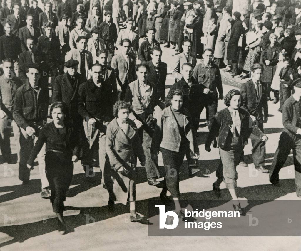 Men and Women of the leftist Popular Front parade in Barcelona, on the Promenade Pi y Margall. March 3, 1937. Spanish Civil War, 1936-1939