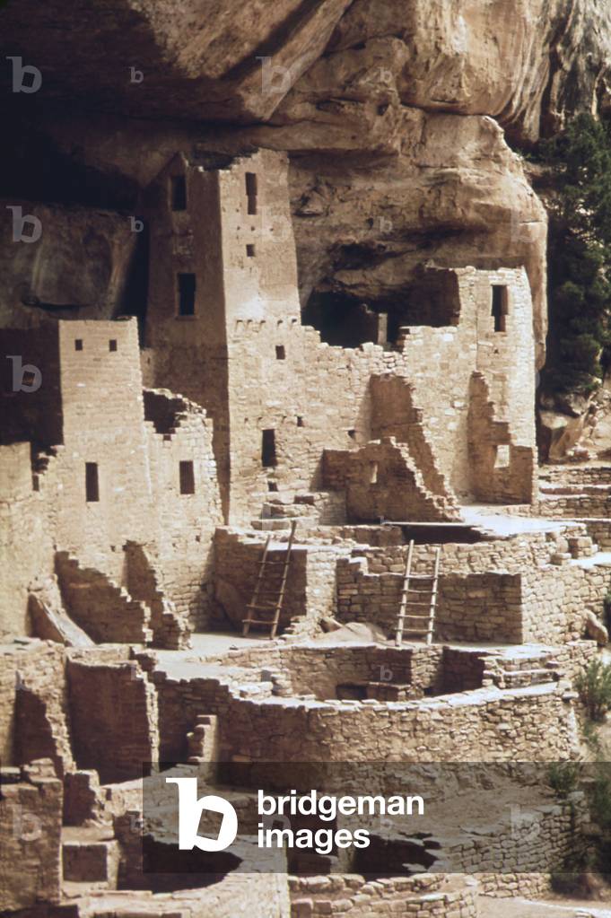 The 'Cliff Palace' at the Mesa Verde site was once a village of over 200 rooms and 23 Kivas. The site was abandoned around 1275 perhaps by drought or the intrusion of people from the North. c. 1973-75