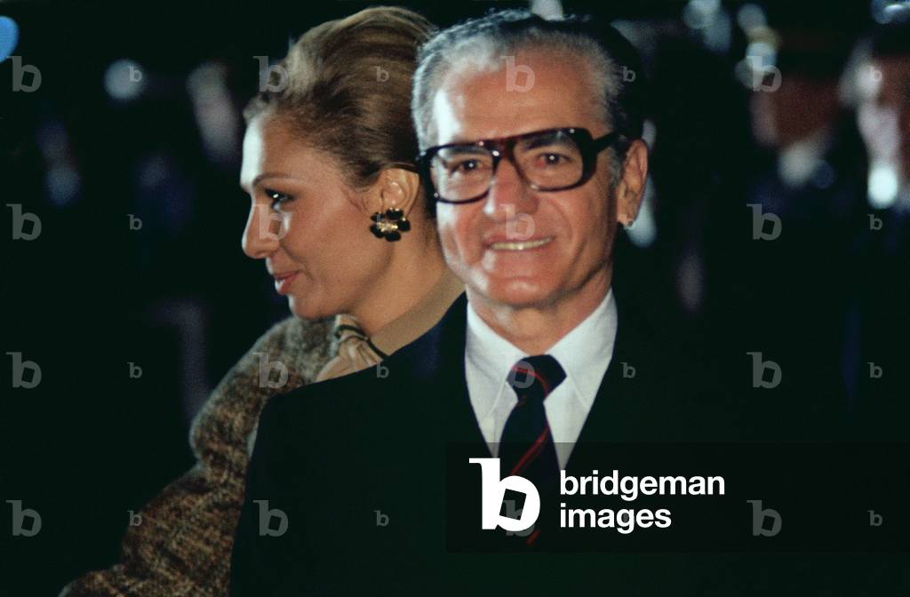 Mohammed Reza Pahlavi Shah of Iran and Empress Farah prepare to depart after a visit to the United States on Nov.16 1977. He was disposed 15 months later by an Islamic Revolution headed by Ayatollah Ruhollah Khomeini., Photo by:Everett Collection