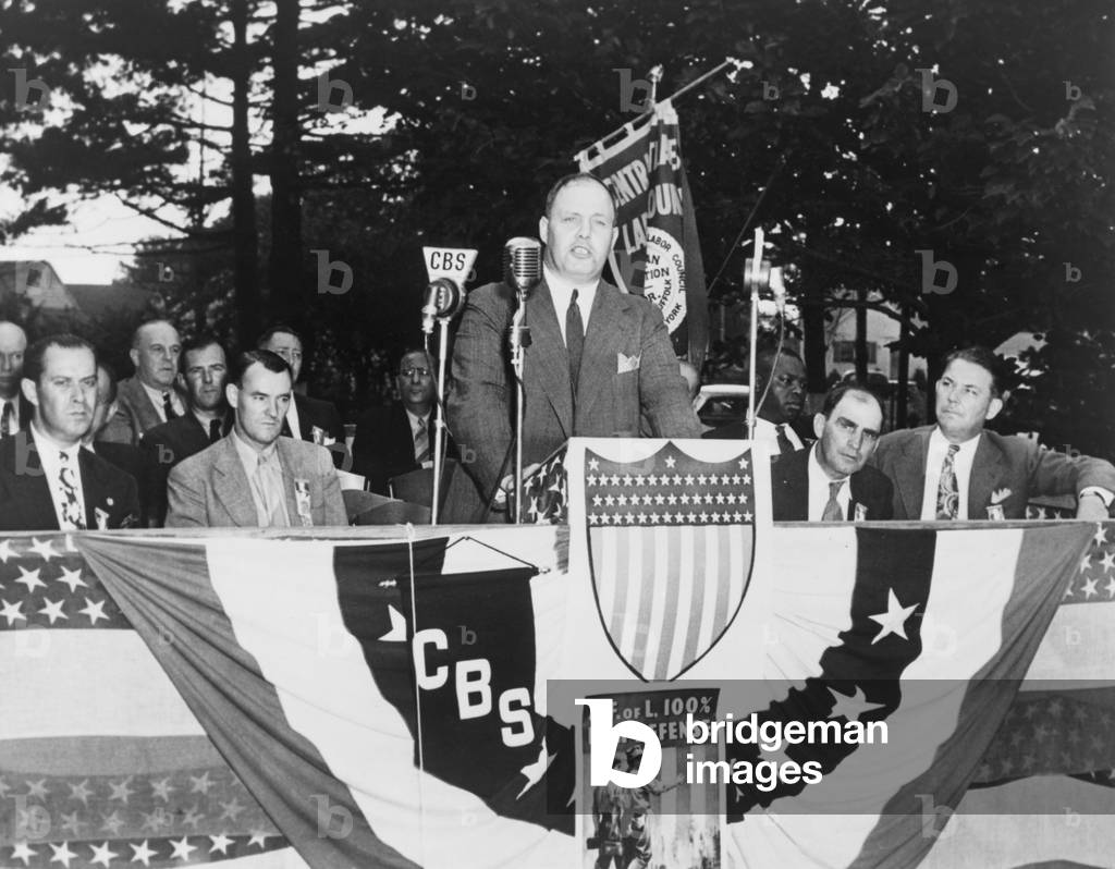 George Meany speaking at the Labor Day exercises held by the Nassau-Suffolk AFL organization, Uniondale, New York, 1941 (b/w photograph)