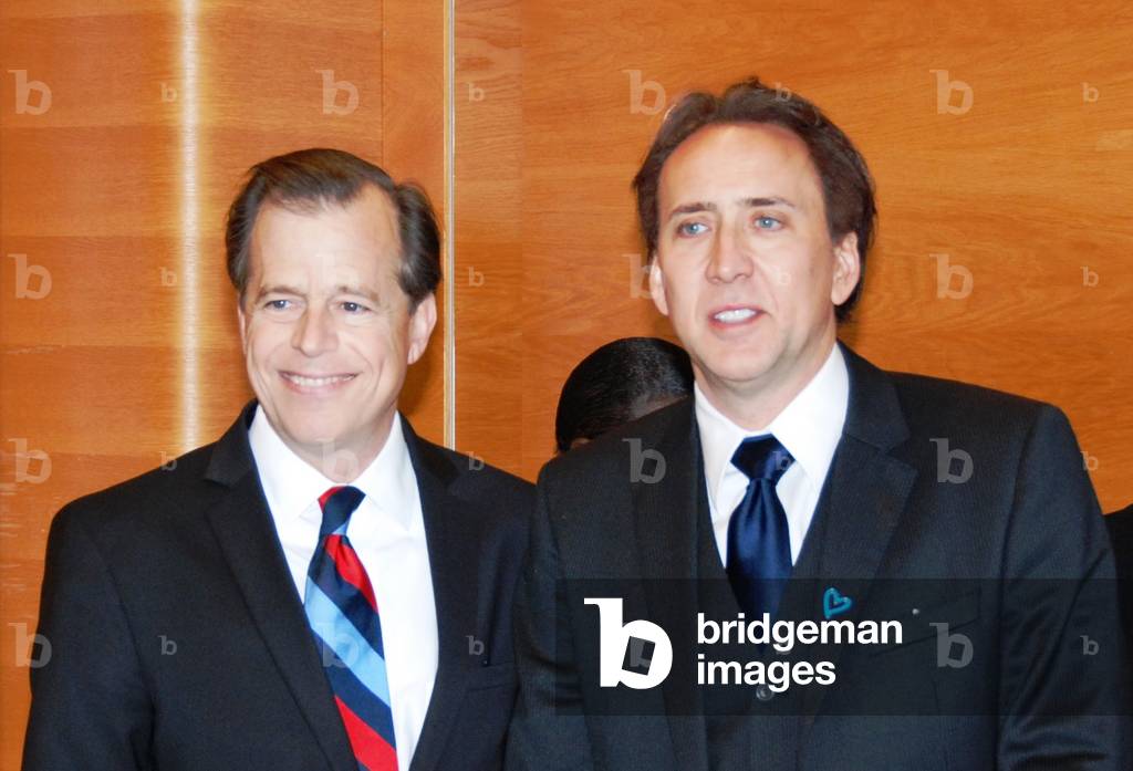 Nicolas Cage Goodwill Ambassador for Global Justice for the UN Office on Drugs and Crime was honored by US Ambassador Glyn Davies in Vienna Austria. In 2009 Cage donated 2 million to rehabilitate former child soldiers providing shelter medical psychological and reintegration services. Oct.21 2010