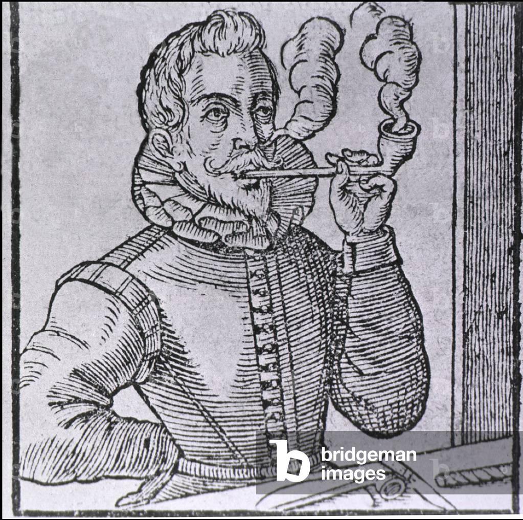16th century Dutchman smoking a long-stemmed pipe, with another pipe and roll of tobacco on the table. Pipe smoking was introduced to Europe in the 16th century by sailors returning from the New World. 1595 wood engraving
