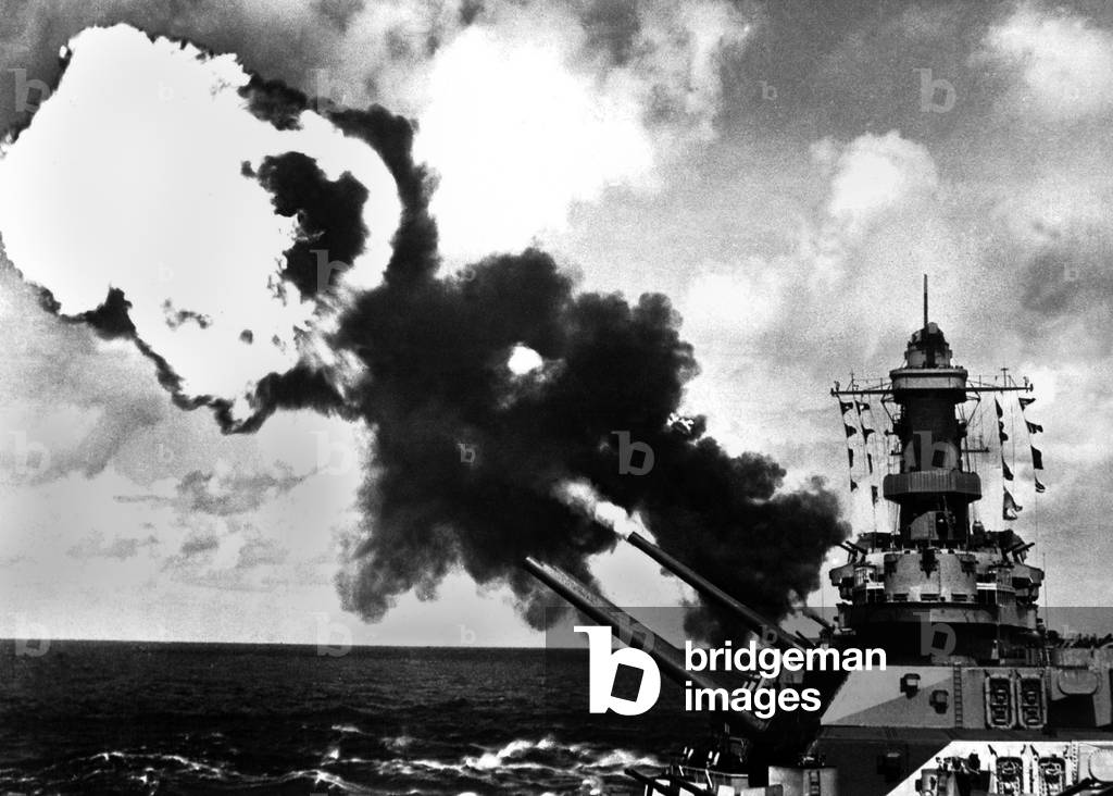 16 inch guns of the USS IOWA firing during World War 2 battle drill in the Pacific. c. 1944