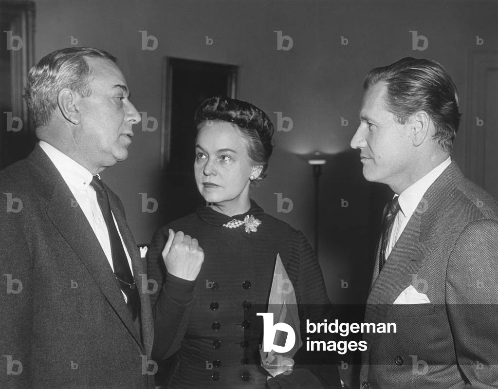 Oveta Culp Hobby flanked by Senator William Purtel and Undersecretary of HEW, Nelson Rockefeller. Dec. 11, 1953. Hobby was second female Cabinet officer and the first Secretary of Health, Education and Welfare. During World War 2 she was the first director of the Women's Army Corps. Rockefeller was instrumental in planning the government reorganization that founded the Dept. HEW