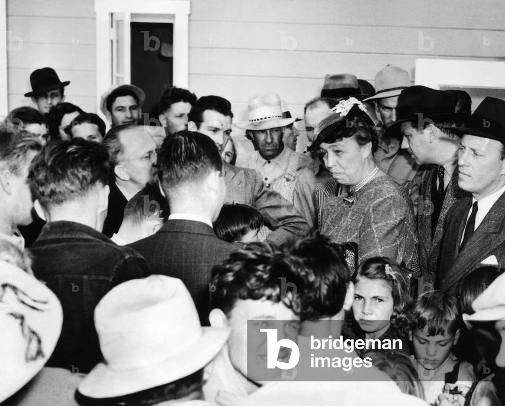 Eleanor Roosevelt visiting migrant workers in at the FSA Farmersville Camp in California, April 2, 1940