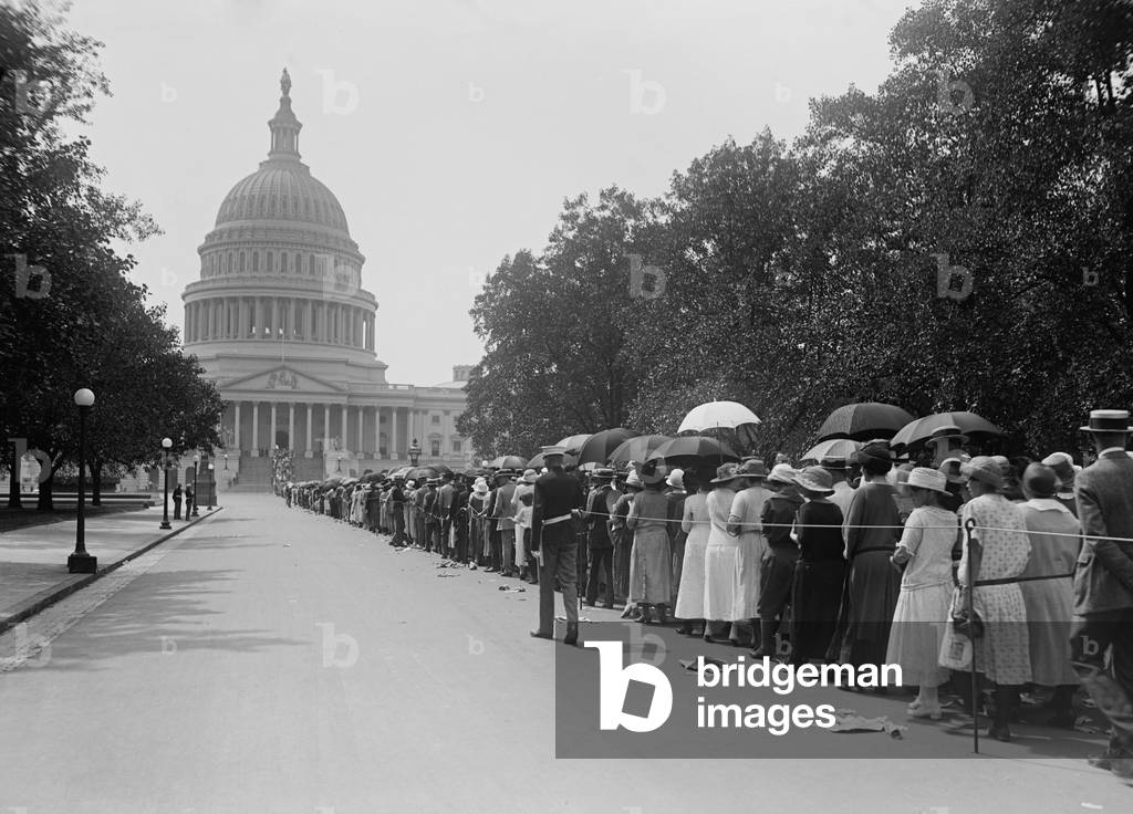 People in long line waiting to pay respects to President Warren Harding in August 1923. Harding died on Aug. 2, and was lying in state at the Capitol before his funeral there on August 8