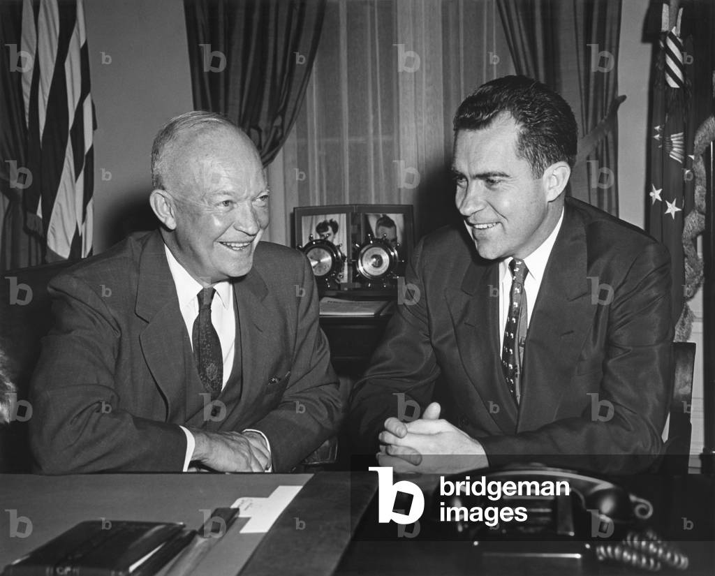 President Eisenhower meeting the VP Richard Nixon in the Oval Office. August 1954. Nixon functioned as the Eisenhower administration's link with Congress and as a spokesman for partisan Republican politics.