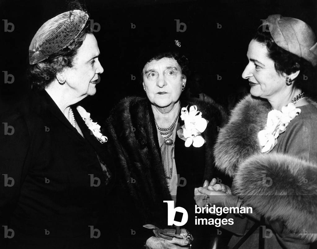 Three women recipients of the 'Togetherness Award'.