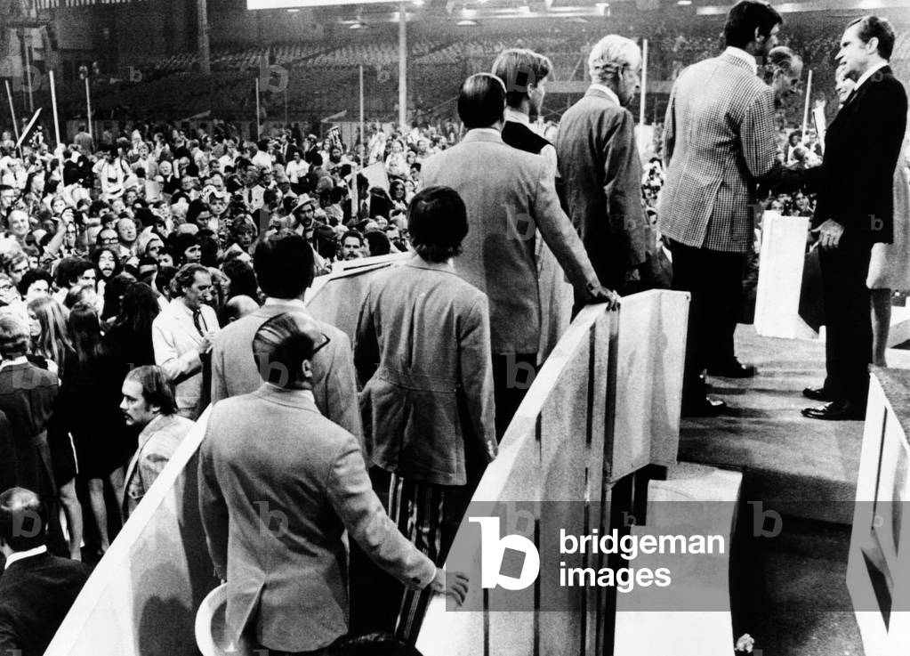 Republican Convention delegates wait to shake the hand of President Richard Nixon after his acceptance speech. Aug. 23, 1972