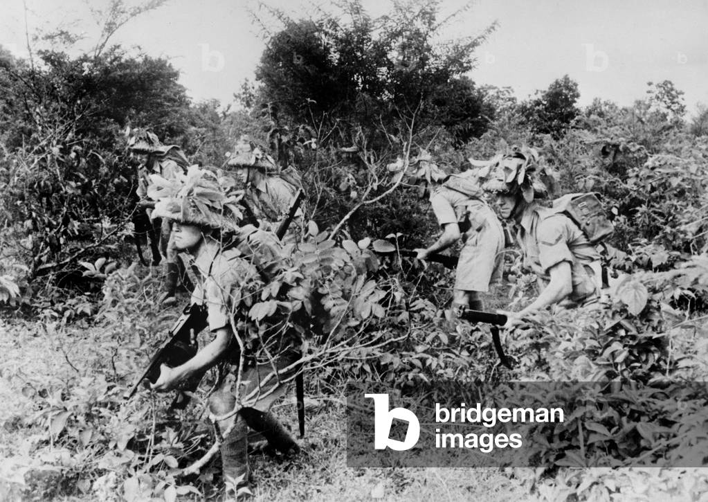 World War II, U.S. soldiers hiding, c.1940-1946