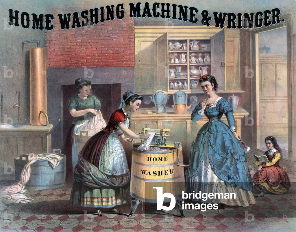 Domestic science. Interior view of a kitchen showing woman using a washing machine as her employer watches. In background another woman washes clothes in a wash tub, 1869