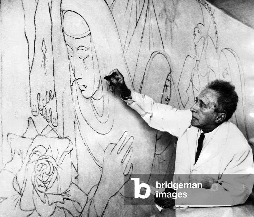 Jean Cocteau works  in the Church of Notre Dame, London, 1959 (b/w photo)