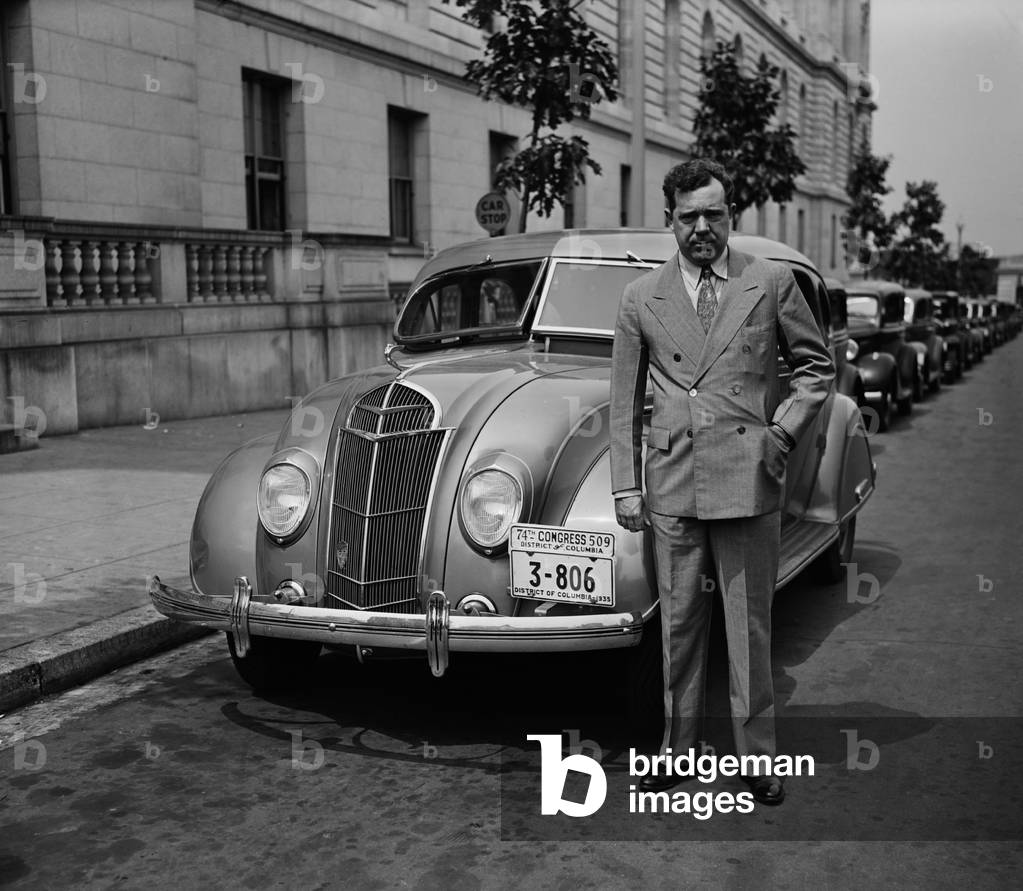 Senator Huey Long stands beside his Desoto car in Washington, D.C. 1935. Broderick Crawford and Sean Penn played a characters based on Long in the 1949 and 2006 films, ALL THE KING'S MEN
