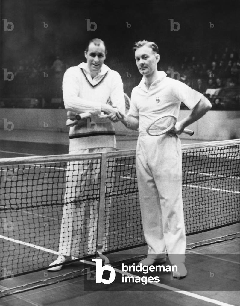 Bill Tilden (left) and George Martin Lott's before their Madison Square Garden match. Jan. 9, 1935. Lott's professional tennis debut at damped by his loss to Tilden 6-4,7-5