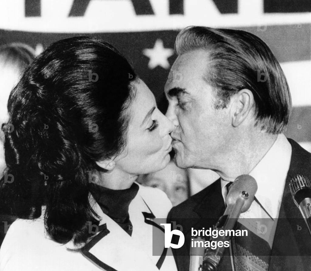 Alabama Governor George Wallace gets a kiss from his wife, Cornelia, after her won the Florida Democratic Primary on March 13, 1972
