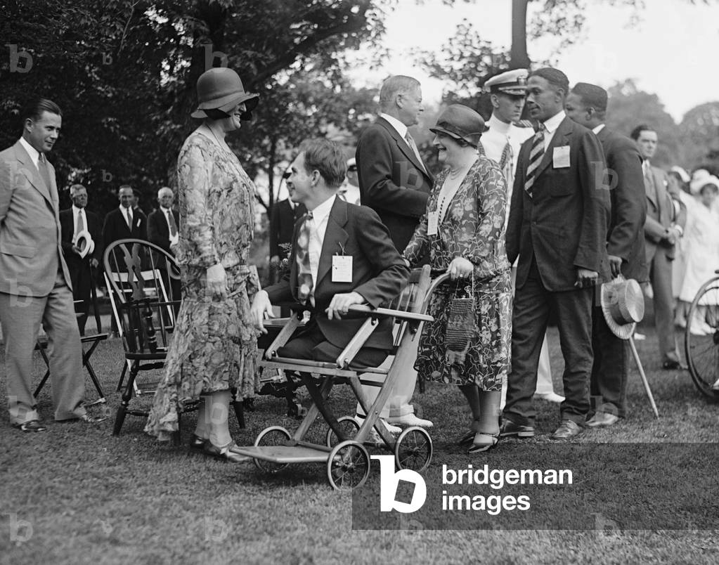 President Herbert Hoover and the First Lady at a White House reception for Veterans, June 27, 1929. The inclusion of an African Americans in a photographed event was likely requested by Hoover
