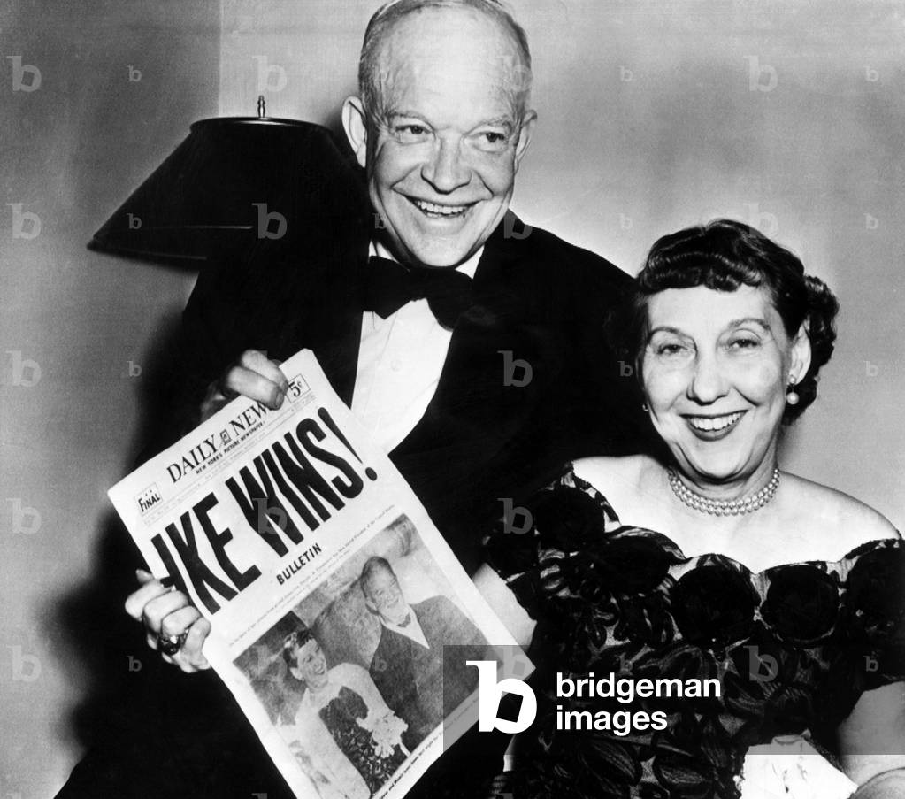President Dwight D. Eisenhower and his wife, Mamie Eisenhower hold up a copy of the New York Daily News headlining Eisenhower's presidential victory. November 5, 1952