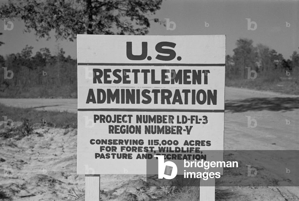 US Resettlement Administration sign for the Withlacoochee Land Use Project. The Public Works Project reforested the area established recreation facilities fire control and telephone communications. Florida Jan 1937