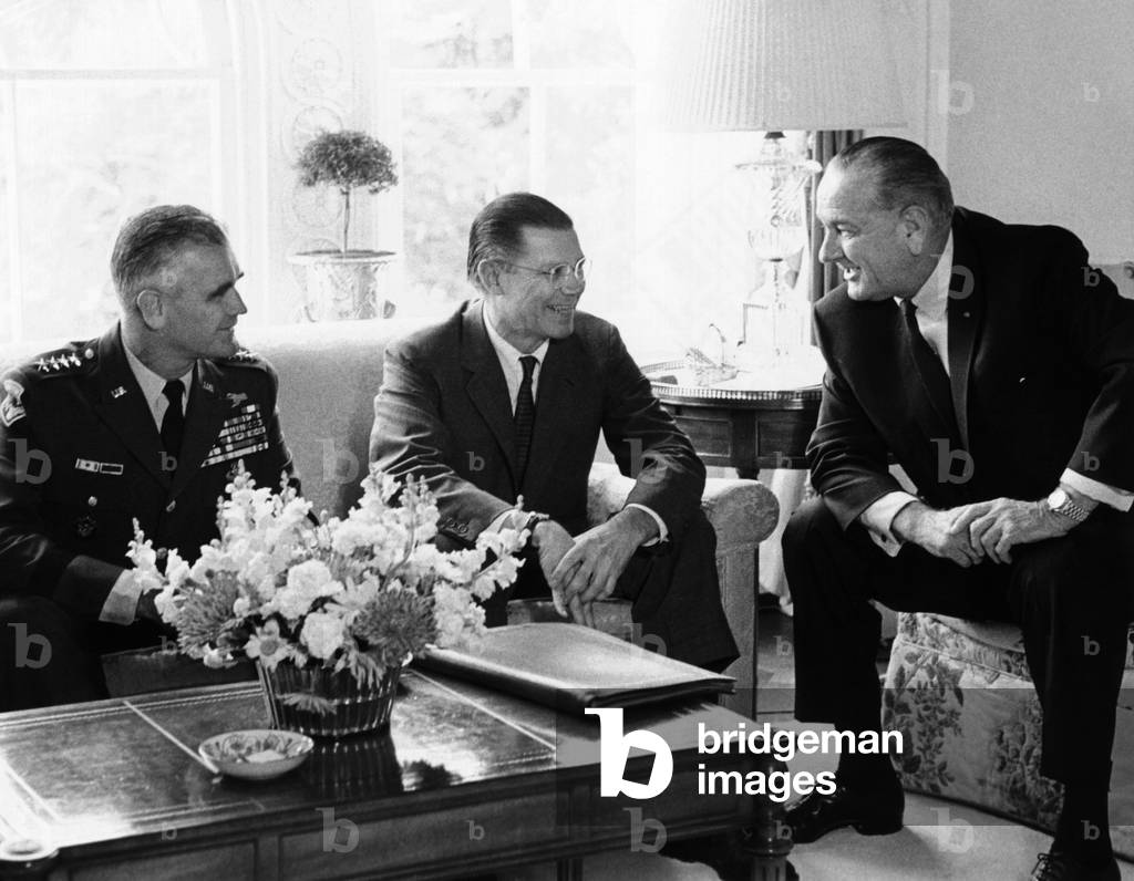 President Lyndon Johnson meeting with Gen. William Westmoreland and Defense Secretary Robert McNamara. They agreed that additional troops would be sent to Vietnam. Aug. 26, 1967