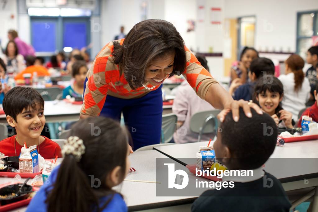 First Lady Michelle Obama at Parklawn Elementary School in Alexandria, Va. Jan. 25, 2012. She visited the school with Agriculture Secretary Tom Vilsack to sample improved school lunches with improved nutrition standards