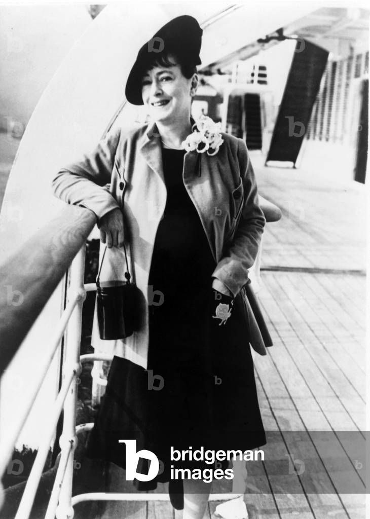 Dorothy Parker (1893-1967), American writer, poetess and member of the Algonquin Round Table, on board an ocean liner in 1939