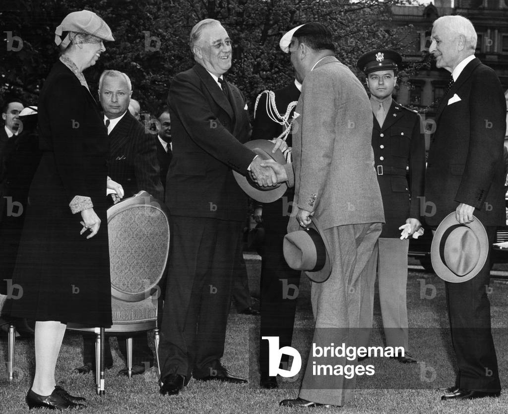 First Lady Eleanor Roosevelt (front left), President Franklin D. Roosevelt (left of center), Bolivia's President Enrique Penaranda (front, right of center), Secretary of State Cordell Hull (right), the White House, May 5, 1943
