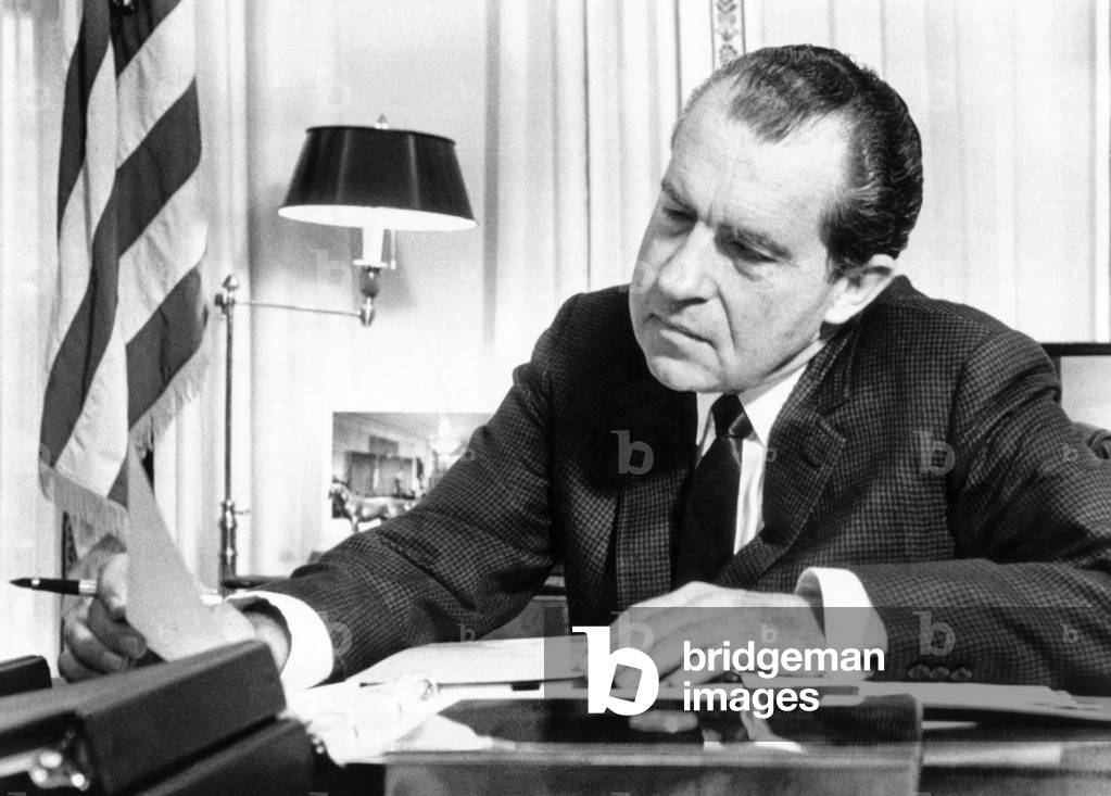 President Richard Nixon in his office at the White House studying background material for his upcoming European trip. Feb. 2, 1969