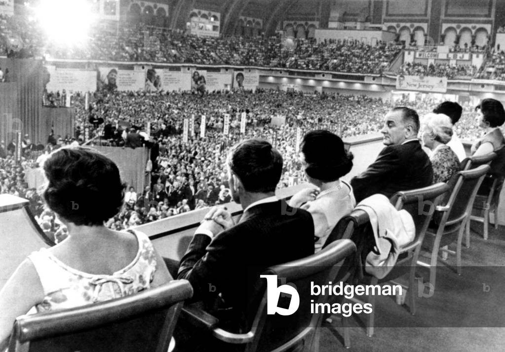LYNDON JOHNSON (4th from left), in Presidential Box overlooking 1964 Democratic National Convention, (l to r): Ethel Kennedy, Robert F. Kennedy, Lady Bird Johnson, President Johnson, Mrs. Muriel Humphrey, Luci Johnson, Linda Bird Johnson, 08/27/64